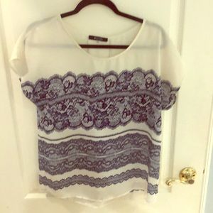 Great navy and white top for work or play!